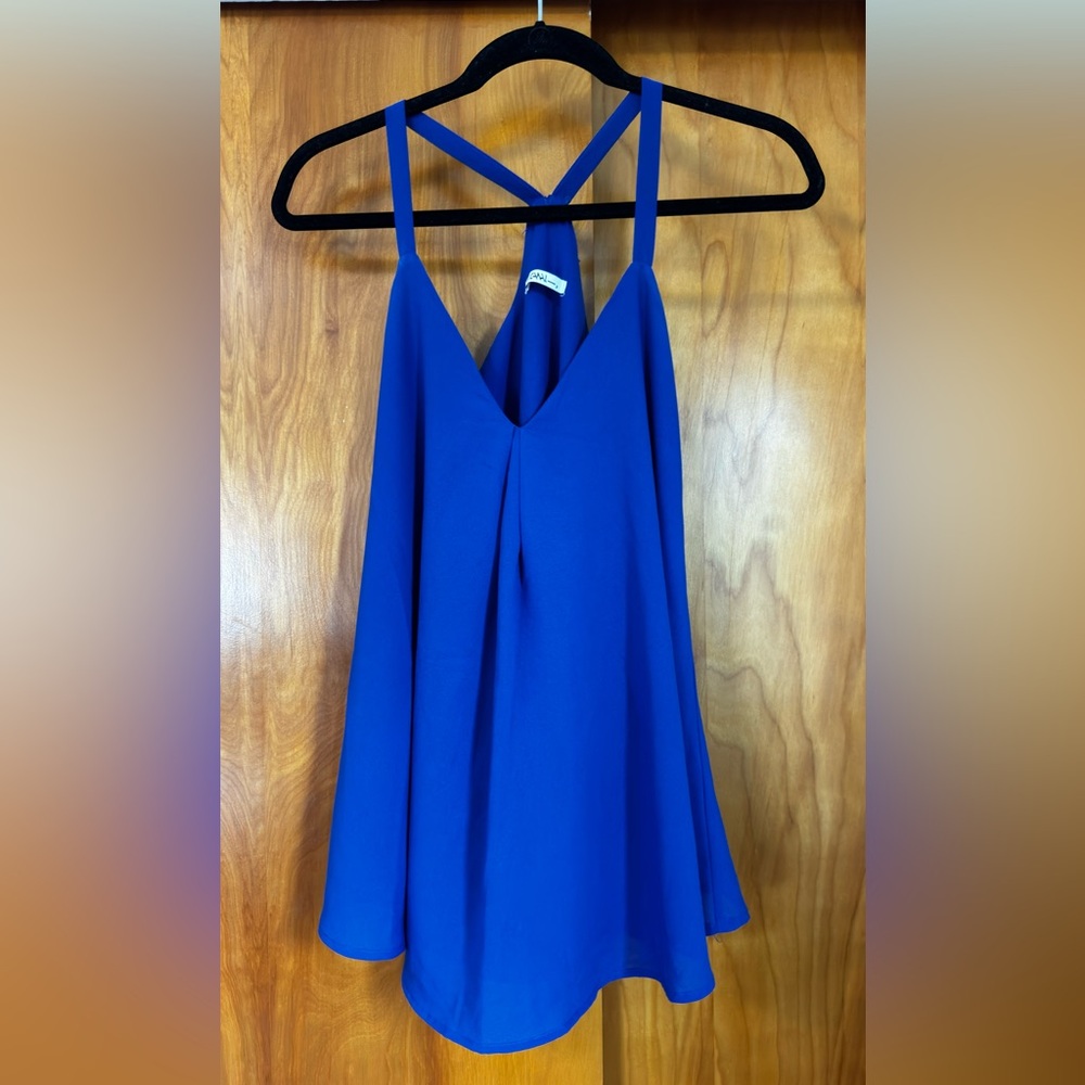 Flattering V-neckline royal blue with straps.